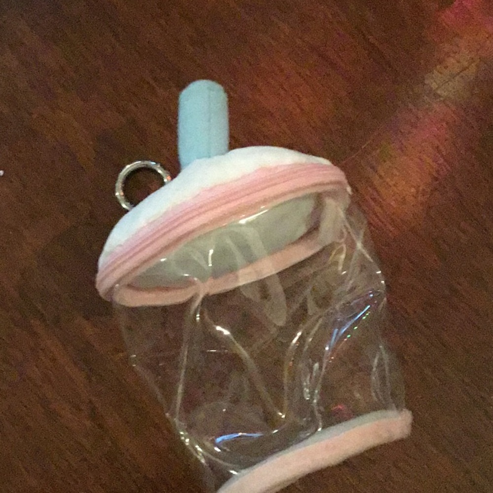 Protective plush drink keychain, for storing plushies inside